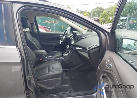 2013 Ford Escape Titanium z USA, uszkodzony, nr VIN 1FMCU9J96DUD84900